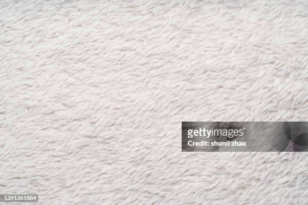 white manufactured fur - kunstpelz stock-fotos und bilder