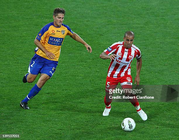 Fred of the Heart is chased by Joshua Brillante of Gold Coast United during the round 20 A-League match between the Melbourne Heart and Gold Coast...