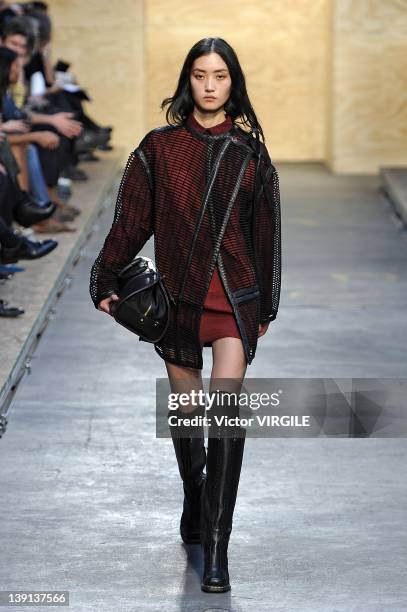 Model walks the runway at the Proenza Schouler Fall 2012 fashion show during Mercedes-Benz Fashion Week on February 15, 2012 in New York City.