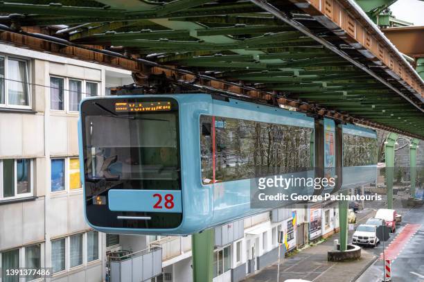 the suspension railway in wuppertal, germany - animal powered vehicle stock pictures, royalty-free photos & images