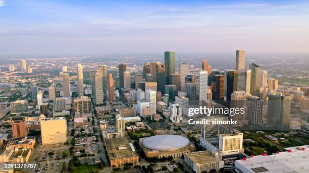 skyscrapers in downtown houston - toyota center houston stock pictures, royalty-free photos & images