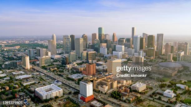 skyscrapers in downtown houston - toyota center houston stock pictures, royalty-free photos & images
