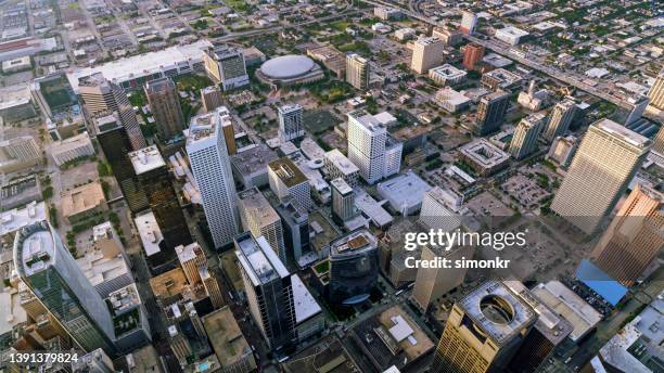skyscrapers in downtown houston - toyota center houston stock pictures, royalty-free photos & images