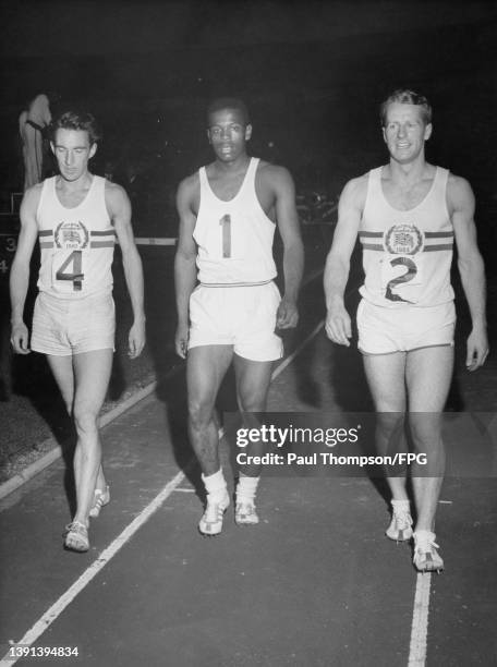 British athlete Peter Radford, American athlete Frank Budd and British athlete David Jones after the 100 yards event of the Great Britain Vs United...