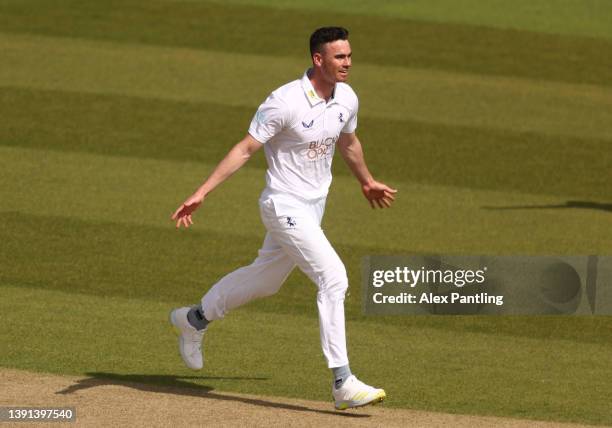 Nathan Gilchrist of Kent celebrates taking the wicket of George Balderson of Lancashire during the LV= Insurance County Championship match between...