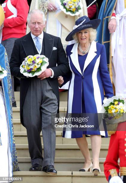 Prince Charles, Prince of Wales and Camilla, Duchess of Cornwall hold nosegays as they attend the Royal Maundy Service at St George's Chapel on April...