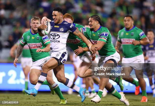 Valentine Holmes of the Cowboys heads to the try line to score during the round six NRL match between the Canberra Raiders and the North Queensland...