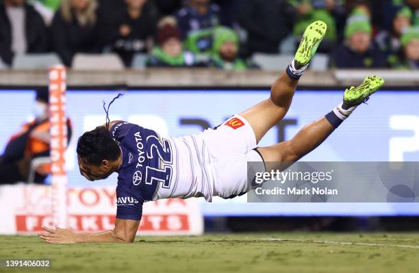 Jeremiah Nanai of the Cowboys socres a try during the round six NRL match between the Canberra Raiders and the North Queensland Cowboys at GIO...