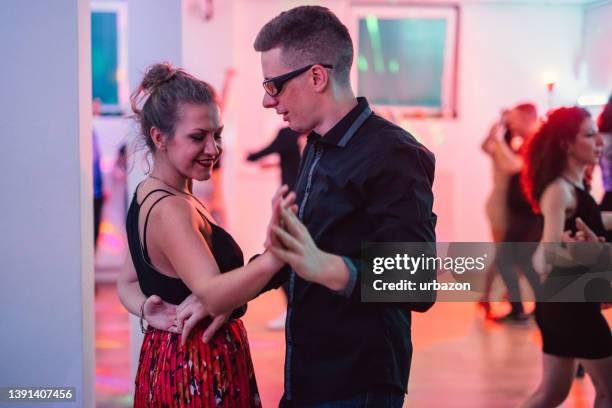 dancing salsa at the party - salsa dancer stock pictures, royalty-free photos & images