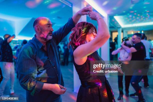 dancing salsa at the party - salsa dancer stock pictures, royalty-free photos & images