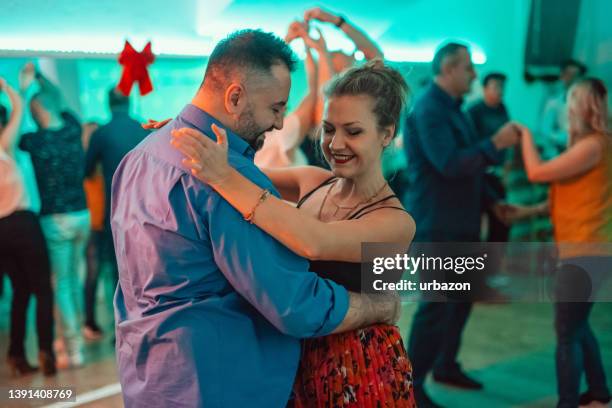 dancing salsa at the party - salsa stock pictures, royalty-free photos & images