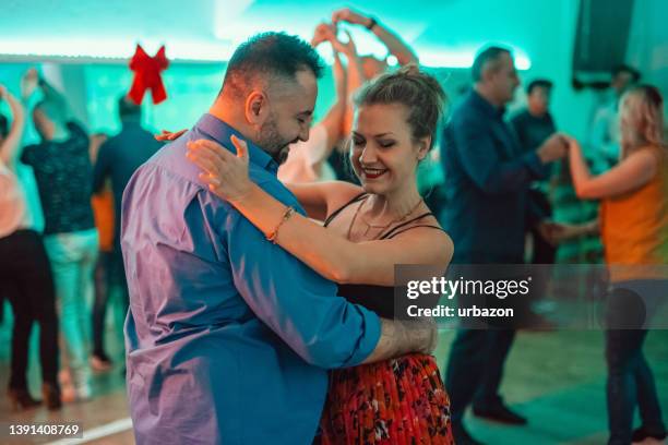 dancing salsa at the party - salsa imagens e fotografias de stock