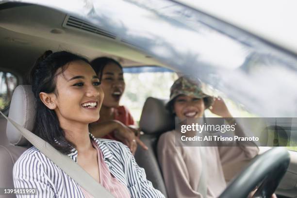 bestie, young girls, travel and roadtrip together - indonesian girl stock pictures, royalty-free photos & images