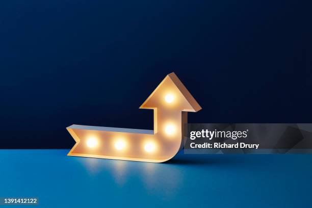 light-up arrow pointing up - improvement stock pictures, royalty-free photos & images