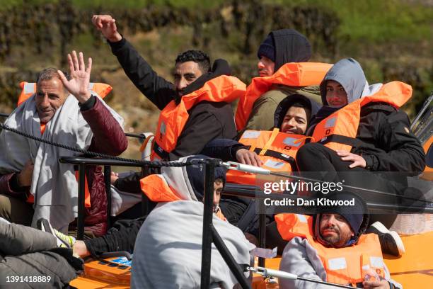 Migrants arrive at Dover port after being picked up in the channel by the border force on April 14, 2022 in Dover, England. The UK government...