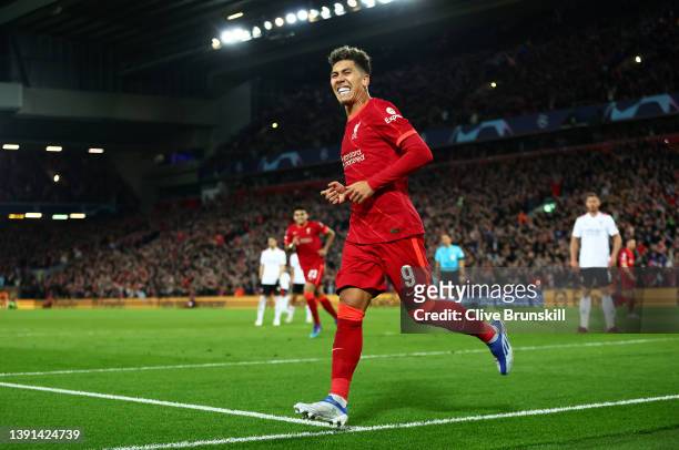 Roberto Firmino of Liverpool celebrates after scoring their team's second goal during the UEFA Champions League Quarter Final Leg Two match between...