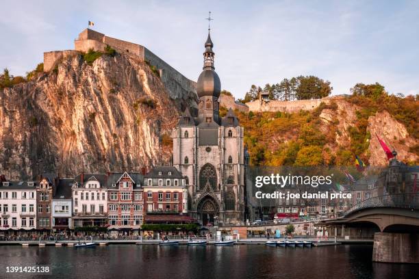 sunset, notre dame de dinant, dinant citadel, dinant, belgium - namur stock-fotos und bilder