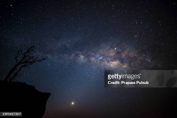 milky way over the mountains of chiang rai, thailand, phuchifha - wat stock pictures, royalty-free photos & images