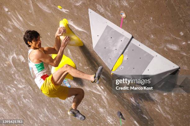 Gholamali Baratzadeh of the Islamic Republic of Iran competes during the men's semifinals of the IFSC Climbing World Cup Meiringen 2022 on April 10,...