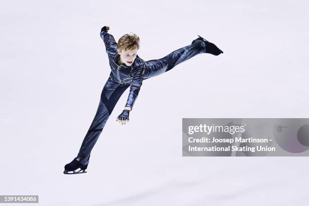 Ilia Malinin of the United States competes in the Junior Men's Short Program during day 1 of the ISU World Junior Figure Skating Championships at...