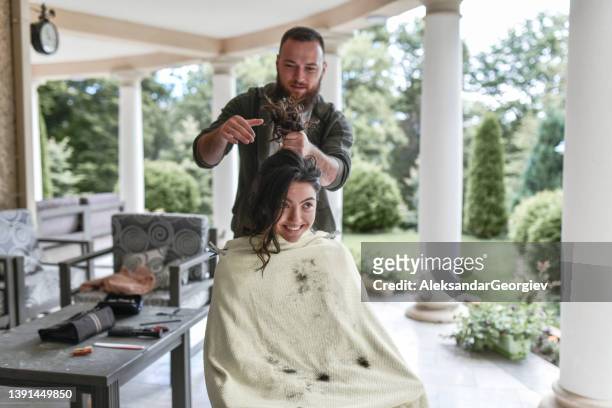 dubious girlfriend getting ready for haircut by boyfriend - beard trimming stock pictures, royalty-free photos & images