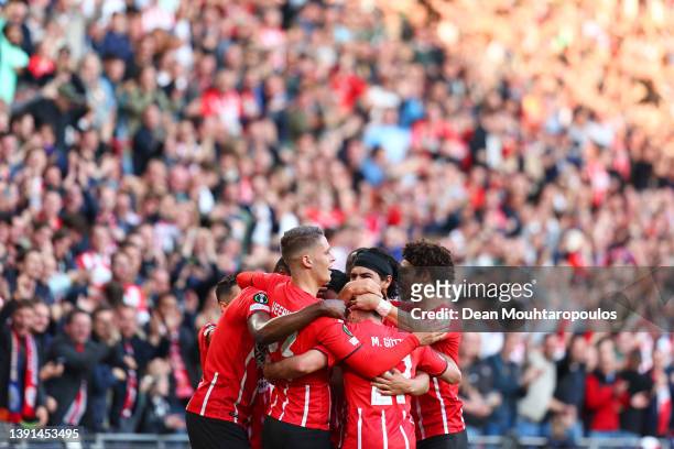 Eran Zahavi of PSV Eindhoven celebrates with teammates after scoring their team's first goal during the UEFA Conference League Quarter Final Leg Two...