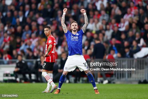 James Maddison of Leicester City celebrates after scoring their team's first goal as Mauro Junior of PSV Eindhoven looks on during the UEFA...