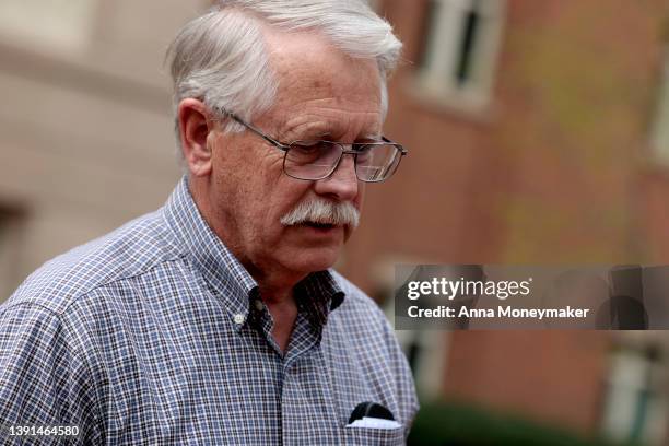 Carl Mueller, the father of Kayla Mueller who was slain by Islamic State militants, speaks to reporters outside of the Albert V. Bryan U.S....