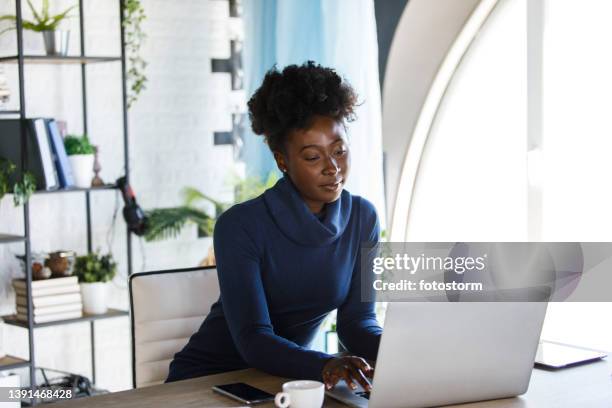 copy space shot of businesswoman logging in on her laptop in the morning - log in stock pictures, royalty-free photos & images