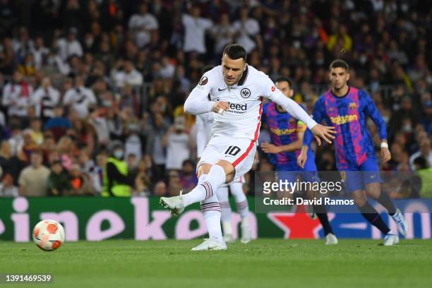 Filip Kostic of Eintracht Frankfurt scores their sides first goal from the penalty spot during the UEFA Europa League Quarter Final Leg Two match...
