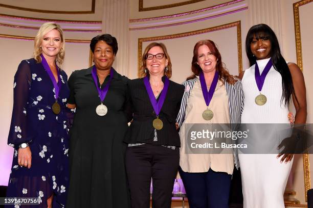 Kathryn Tappen, Dawn Porter, Nicole Newnham, Allison Glock, and Aja Evans pose onstage during The WICT Network Signature Luncheon at The Plaza on...