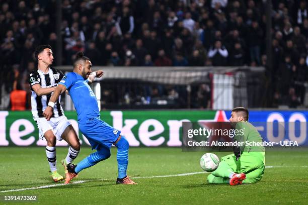Dimitri Payet of Marseille scores their sides first goal past Alexandros Paschalakis of PAOK Salonika during the UEFA Conference League Quarter Final...