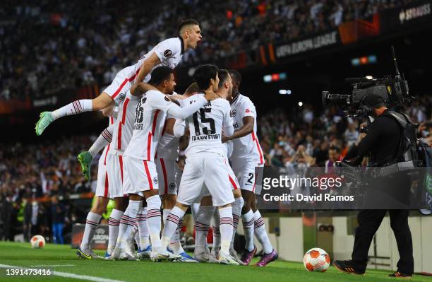 Filip Kostic of Eintracht Frankfurt celebrates with team mates after scoring their sides first goal during the UEFA Europa League Quarter Final Leg...