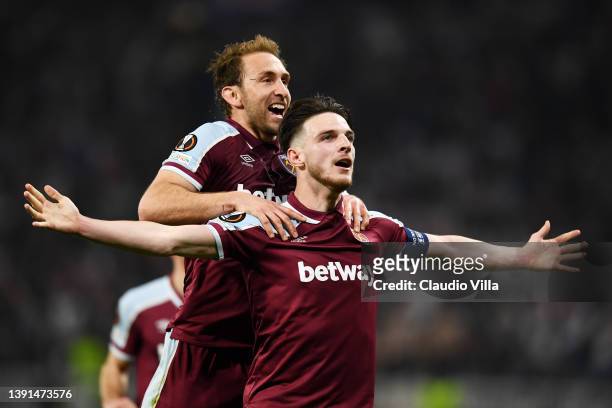 Declan Rice of West Ham United celebrates with team mate Craig Dawson after scoring their sides second goal during the UEFA Europa League Quarter...