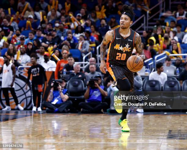 Markelle Fultz of the Orlando Magic dribbles the ball during the third quarter against the Miami Heat at Amway Center on April 10, 2022 in Orlando,...