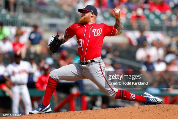 Sean Doolittle of the Washington Nationals pitches during the seventh inning of an MLB game against the Atlanta Braves at Truist Park on April 13,...