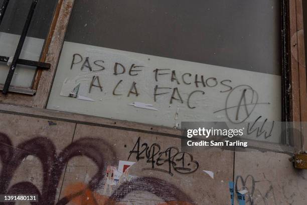 Anti-fascist graffiti that translates loosely as "no fascists in the faculty," at the Sorbonne University, on April 14 in Paris, France. Students...