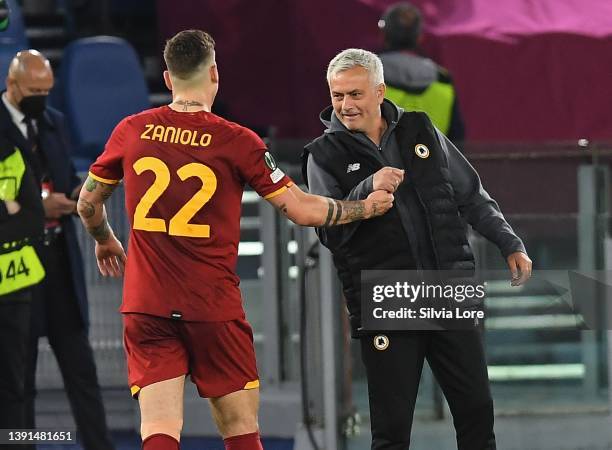 Jose Mourinho head coach of AS Roma greets Nicolò Zaniolo during the UEFA Conference League Quarter Final Leg Two match between AS Roma and FK...