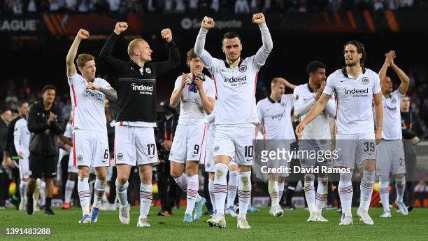 Filip Kostic and team mates of Eintracht Frankfurt celebrate following their sides victory after the UEFA Europa League Quarter Final Leg Two match...