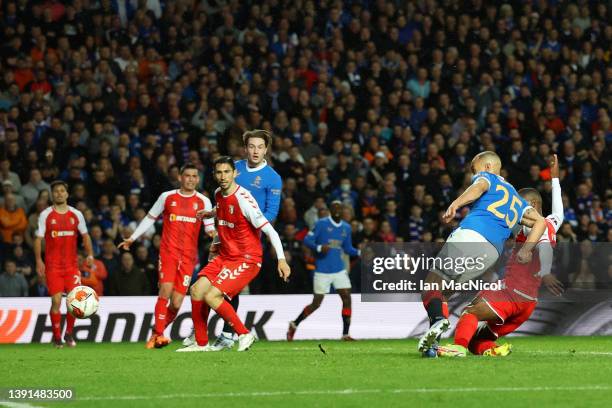 Kemar Roofe of Rangers scores their team's third goal during the UEFA Europa League Quarter Final Leg Two match between Rangers FC and Sporting Braga...