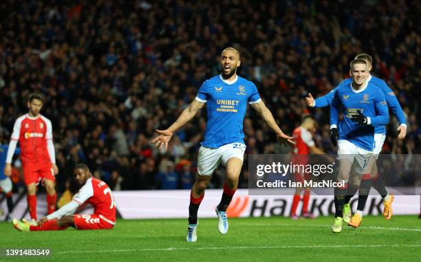 Kemar Roofe of Rangers celebrates after scoring their team's third goal during the UEFA Europa League Quarter Final Leg Two match between Rangers FC...