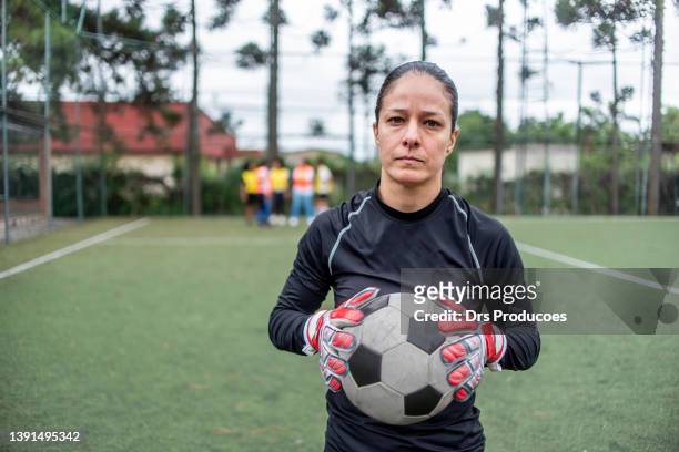 portrait of a goalkeeper - woman goalie stock pictures, royalty-free photos & images