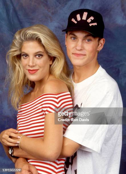 American actress and author Tori Spelling and American actor and producer Brian Austin Green, pose for a portrait circa 1992 in Los Angeles,...