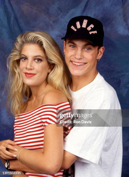 American actress and author Tori Spelling and American actor and producer Brian Austin Green, pose for a portrait circa 1992 in Los Angeles,...