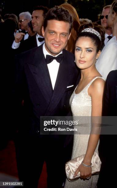 Mexican singer Luis Miguel and Mexican and American actress and producer Salma Hayek, attend The 69th Annual Academy Awards - Arrivals on March 24,...