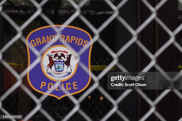 Fence surrounds the entrance to the Grand Rapids police station following the killing of Patrick Lyoya on April 14, 2022 in Grand Rapids, Michigan....