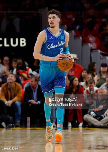 LaMelo Ball of the Charlotte Hornets drives down the court during the first half against the Atlanta Hawks at State Farm Arena on April 13, 2022 in...
