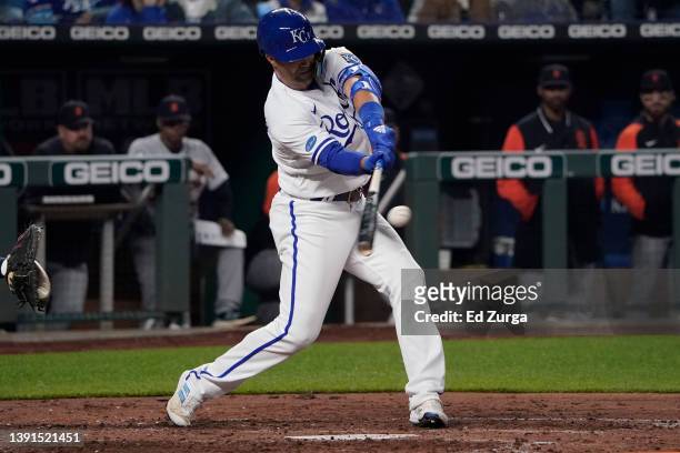 Whit Merrifield of the Kansas City Royals hits an RBI single in the fourth inning against the Detroit Tigers at Kauffman Stadium on April 14, 2022 in...
