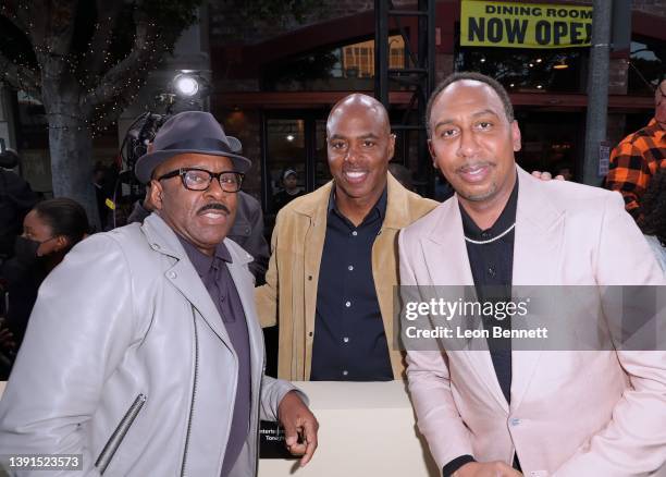 Courtney B. Vance, Kevin Frazier and Stephen A. Smith attend the Los Angeles premiere of Apple's "They Call Me Magic" at Regency Village Theatre on...