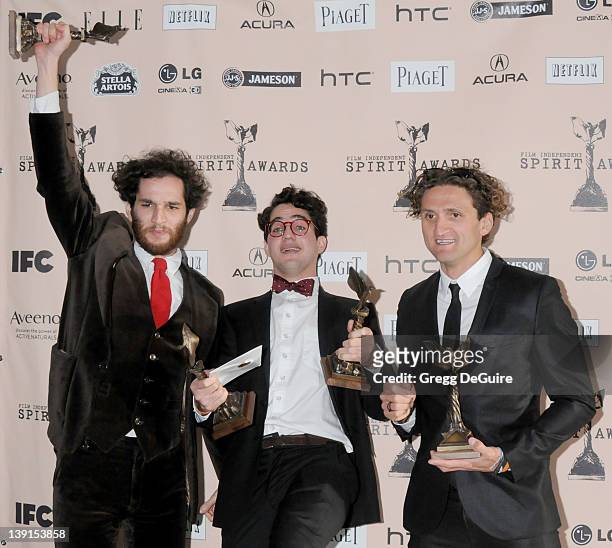 Director Josh Safdie, director Benny Safdie and producer Casey Neistat, winners of the John Cassavetes award for 'Daddy Longlegs' pose in the press...